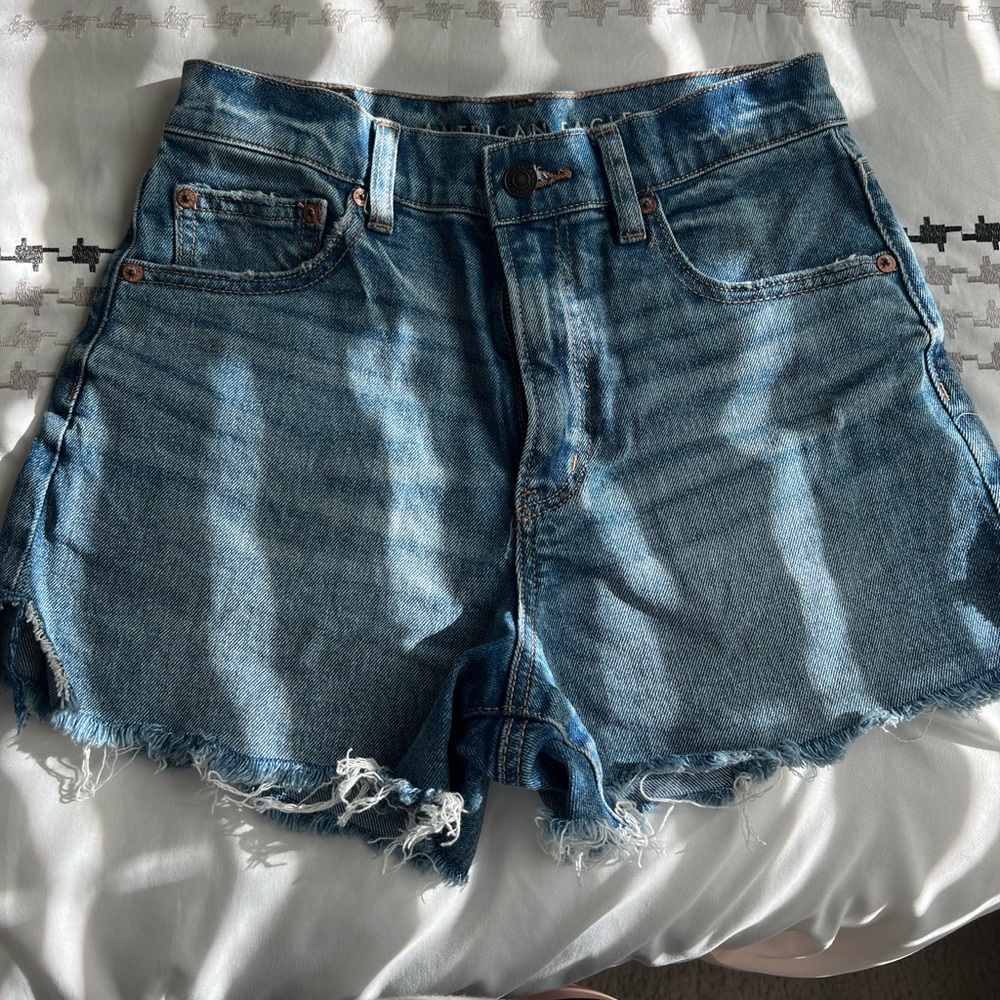 Medium wash American Eagle shorts 
Size 2